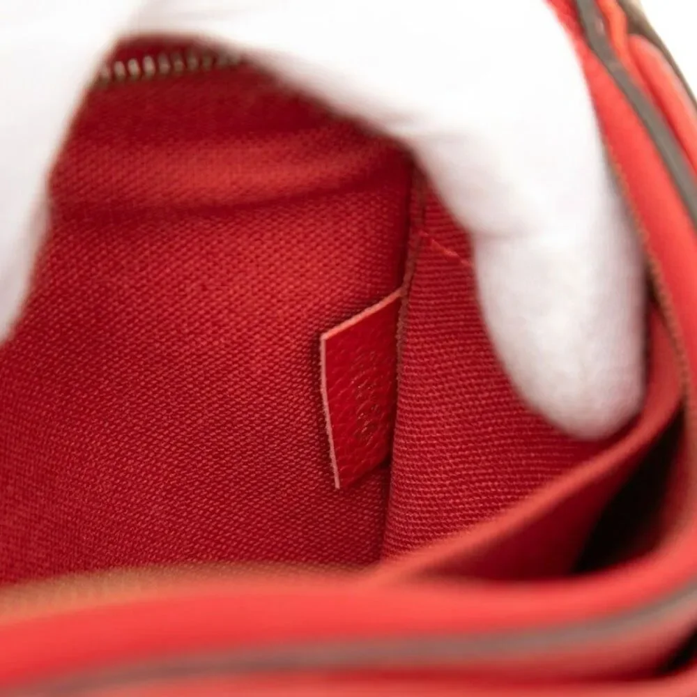 Louis Vuitton Pallas Monogram Clutch